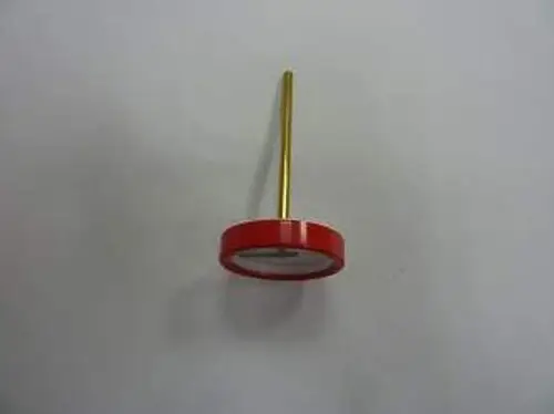 Remeha Thermometer mit rotem Gehäuse und goldenem Stab, zum Messen von Temperaturen in verschiedenen Anwendungen.